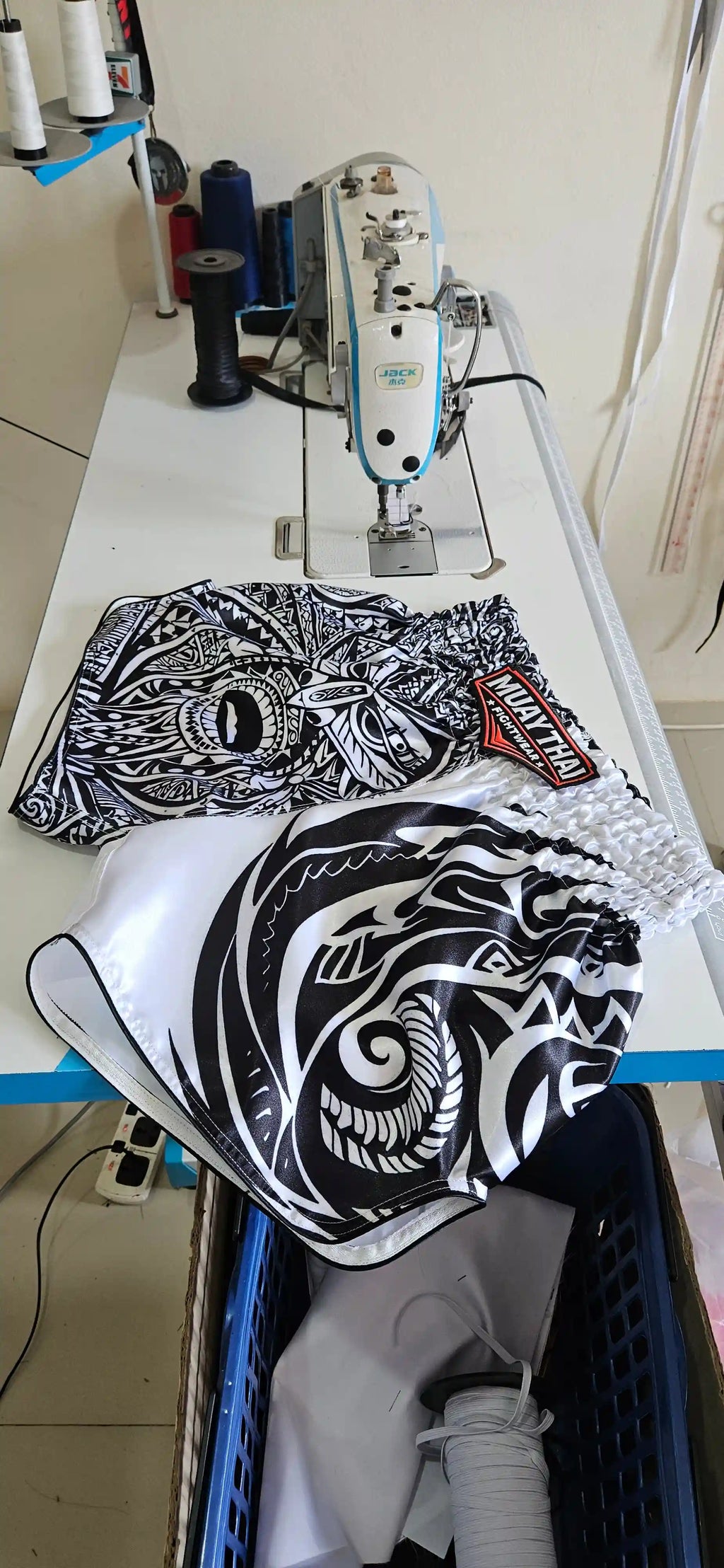 Maori Reign Muay Thai shorts – fighter during intense gym sparring session – shop elite tribal fight wear Thailand
