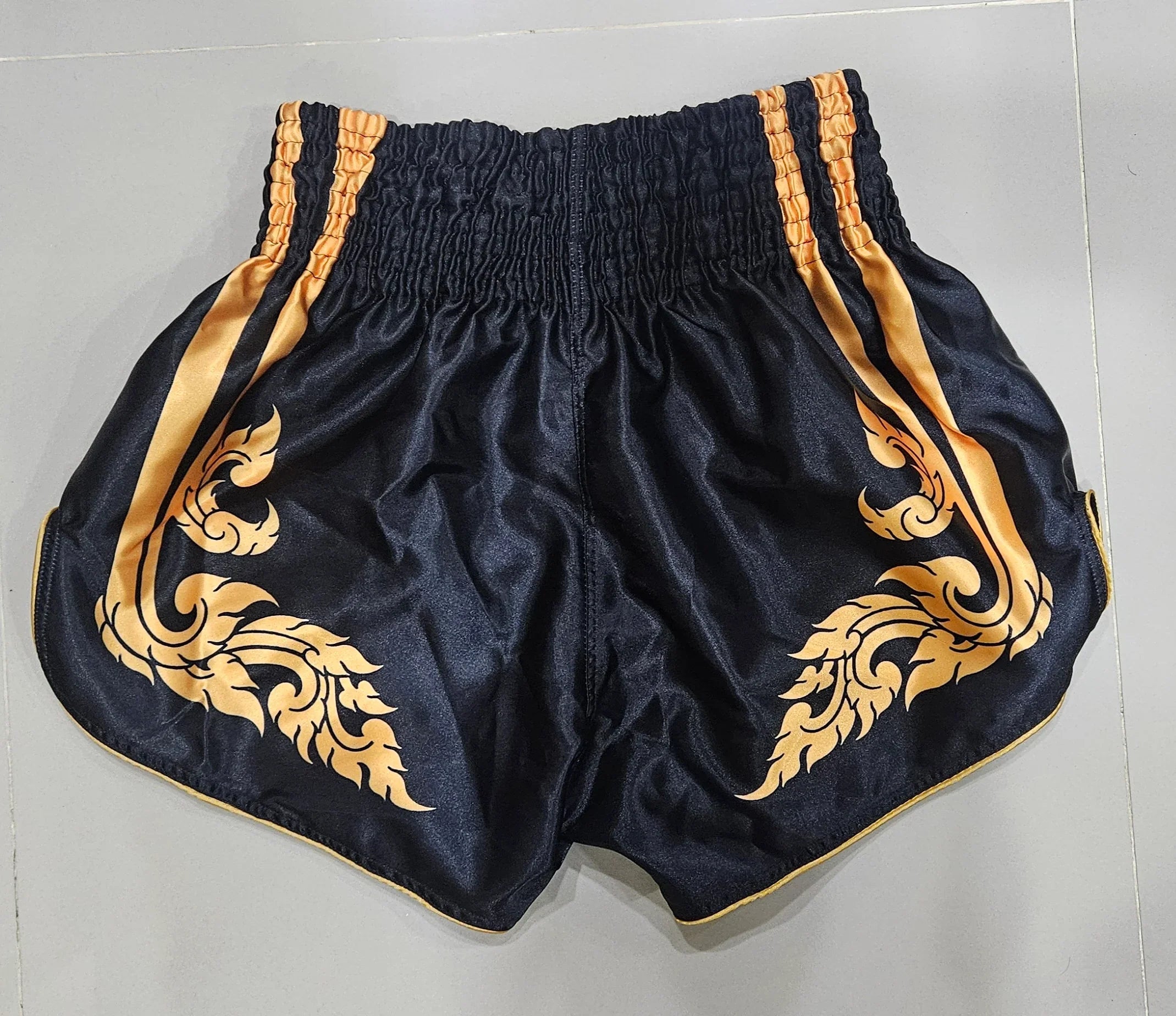 Professional Muay Thai Shorts – Black & Gold Edition