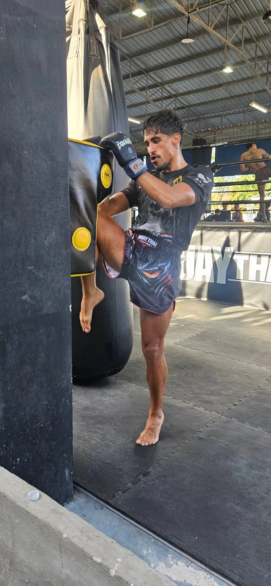 Shadow Predator Muay Thai shorts rear view – bold dark predator design with premium stitching – buy fight shorts Thailand
