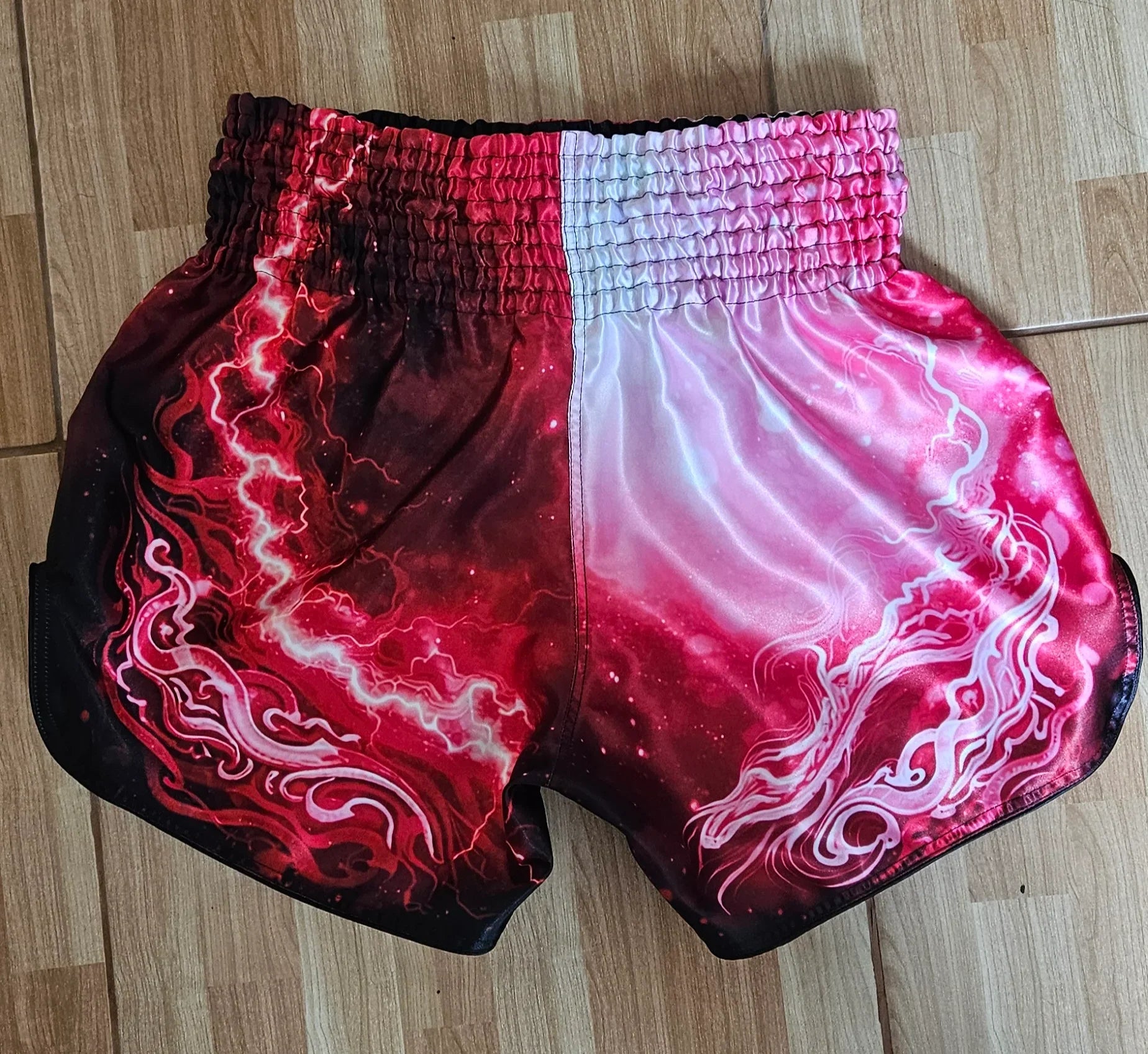 Snake Tiger Muay Thai shorts – tiger stripe and snake print detail close-up – shop premium fight wear Thailand

