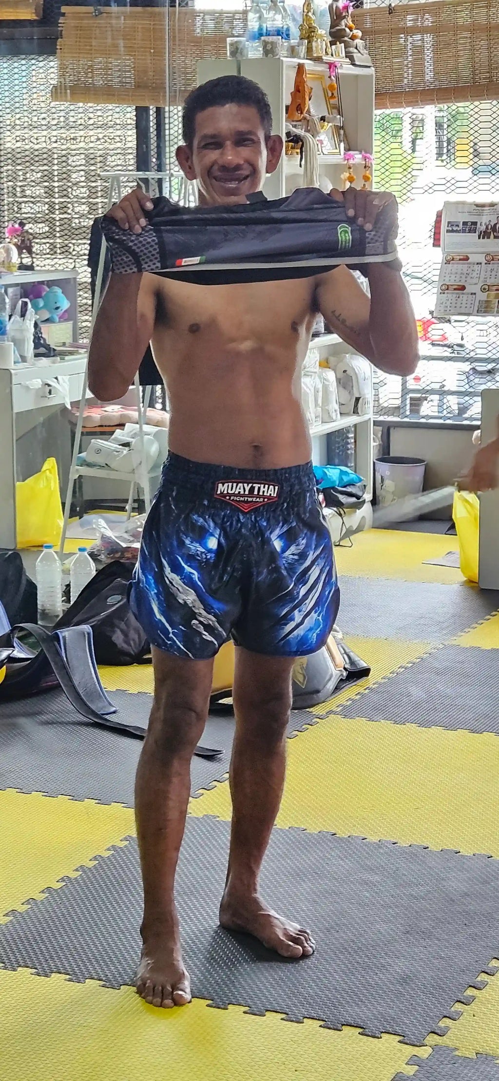 Storm Beast Muay Thai shorts – dominant fighter look in premium dark fight shorts – buy elite Muay Thai gear now
